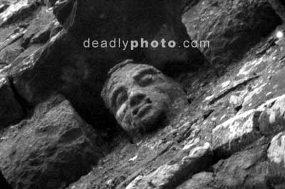 A carved head on the tower at the Hill of Slane