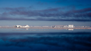 Arctic icebergs and low cloud in Kane Basin, North West Greenland