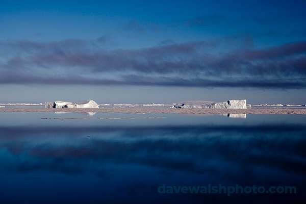 Arctic icebergs and low cloud in Kane Basin, North West Greenland