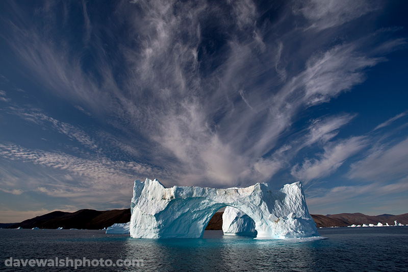 Iceberg: Cirrus clouds over iceberg