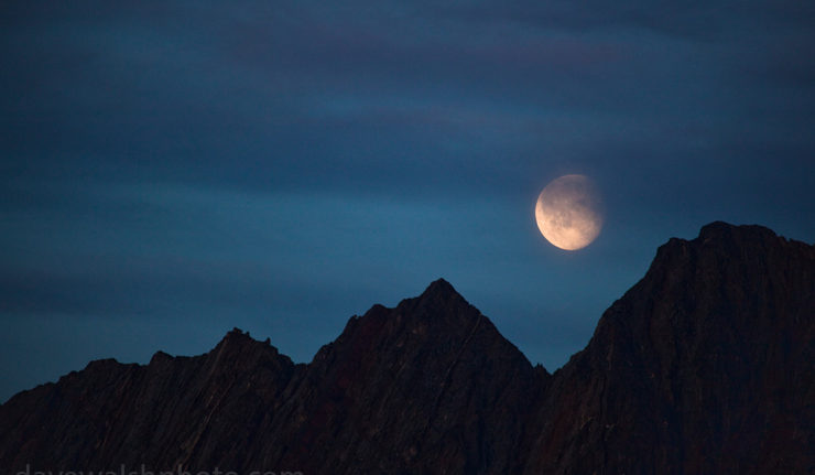 Moon rising over mountains in Nugatsiaq, Baffin Bay, Greenland