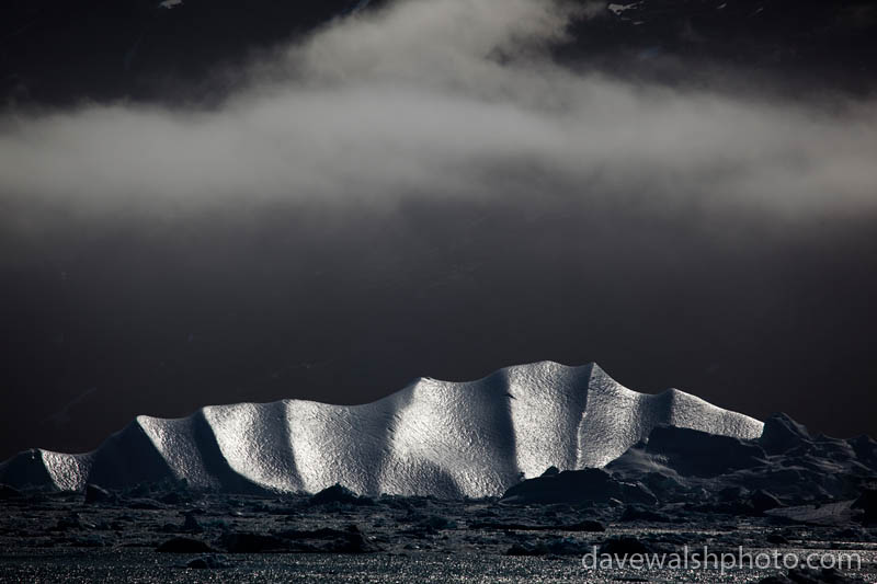 Iceberg under cloud, Kangerdlussuaq Fjord, East Greenland
