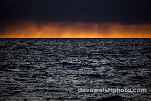 Snowing on the sunset at the mouth of Isfjord, Svalbard