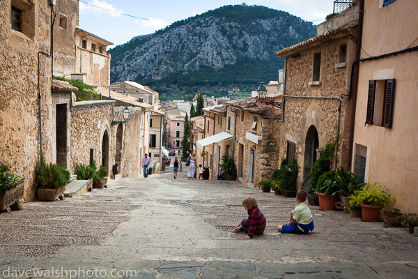 El Calvari: Two young boys sit on the 365 steps of Calvary, Pollensa, in north western Mallorca.