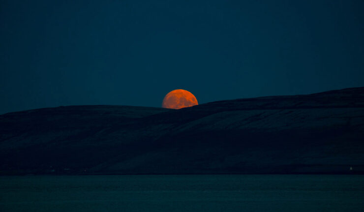 Supermoon moonrise over Galway Bay and the Burren, August 2022