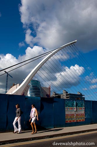 Two women walking by the Samuel Beckett Bridge, Dublin by Santiago Calatrava